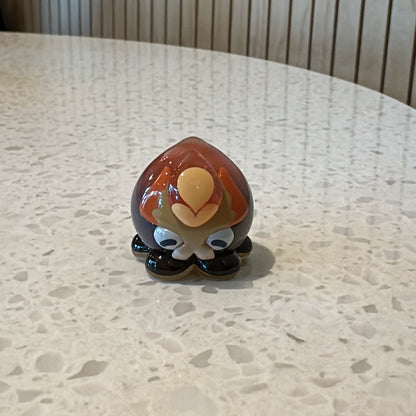 Front view of regular brown ball octopus from Genshin Impact's Fontemer Aberrant enemies