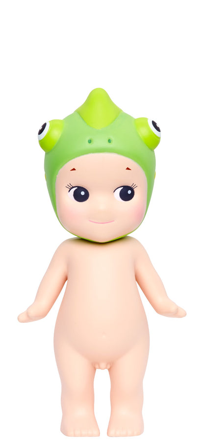 Toy figure with a green chameleon helmet on a white background