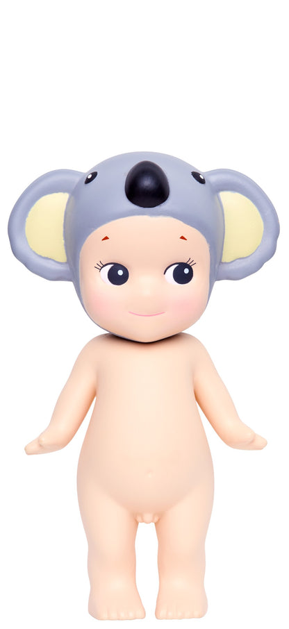 Toy figure with elephant head on a white background