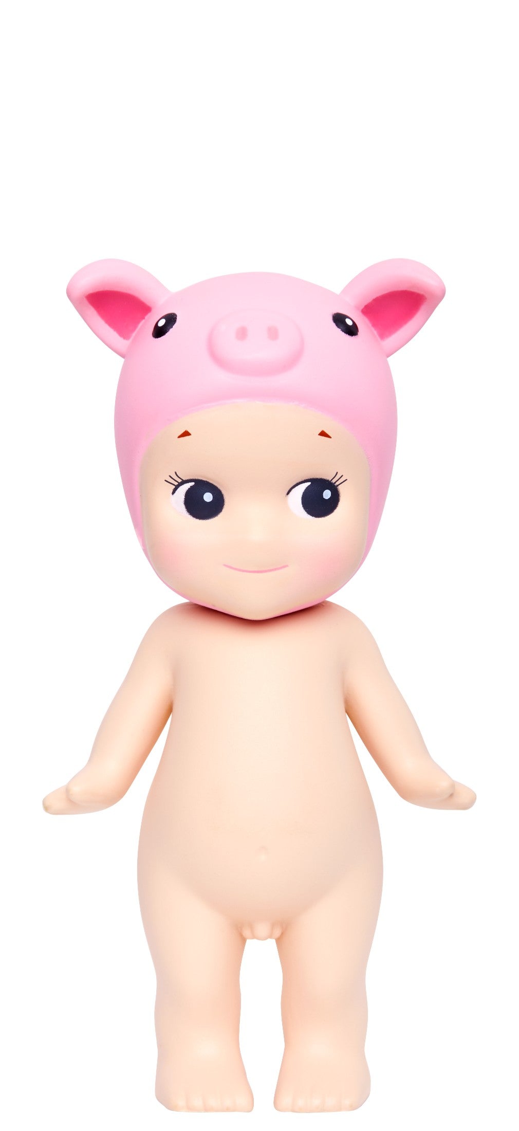 Toy figure of a baby in a pink pig costume on a white background