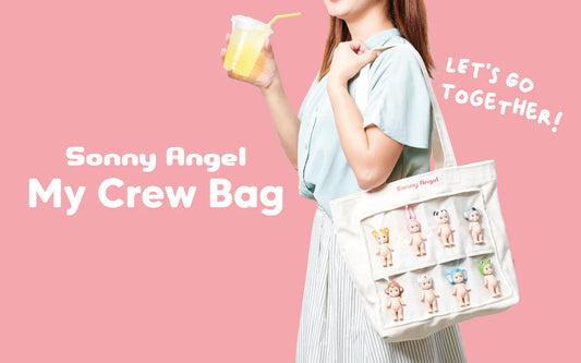 Woman holding a 'Sonny Angel My Crew Bag' with small figures on a pink background