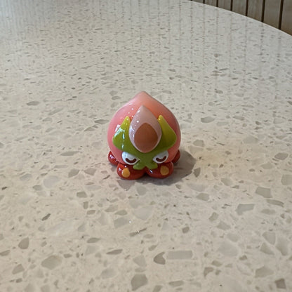 Front view of regular pink ball octopus from Genshin Impact's Fontemer Aberrant enemies