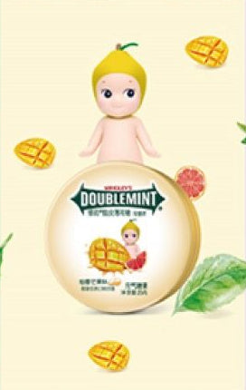 Doublemint gum packaging with a cartoon baby and fruit illustration on a light yellow background