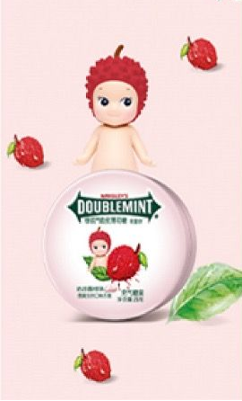 Doublemint product with cartoon character and strawberries on a pink background