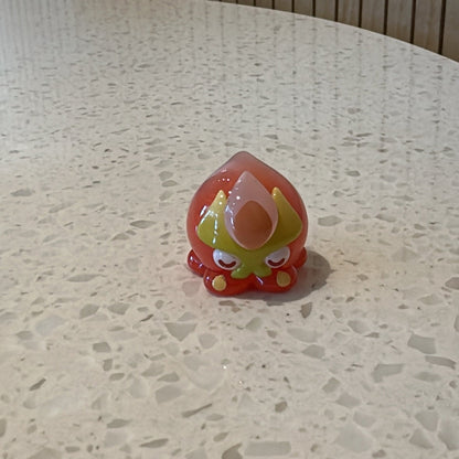 Front view of translucent pink ball octopus from Genshin Impact's Fontemer Aberrant enemies